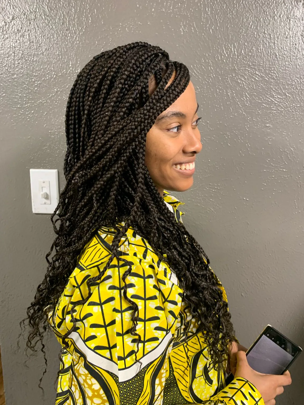 Black-Long-Box-Braids-with-soft-loose-curly-ends-side-view